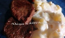 Manzat la tava cu garnitura gratinata